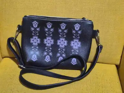 womens Black crossbody bag with floral pattern, View more