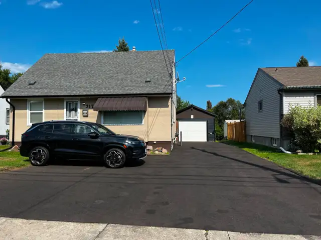 LEGAL CONFORMING MAIN FLOOR DUPLEX SUITE