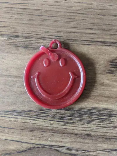 Small, red happy face Hanging decoration For FREE