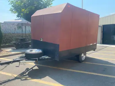 Selling a solid 10ft single-axle enclosed cargo trailer located in Kelowna. It is a 20-year-old trai...