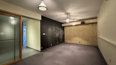 Industrial-style office space perfect for professional services/agency offices. This corner unit fea...