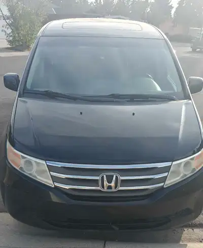 Selling my 2012 Honda Odyssey EXL. Leather loaded with power windows, power locks, power sliding rea...