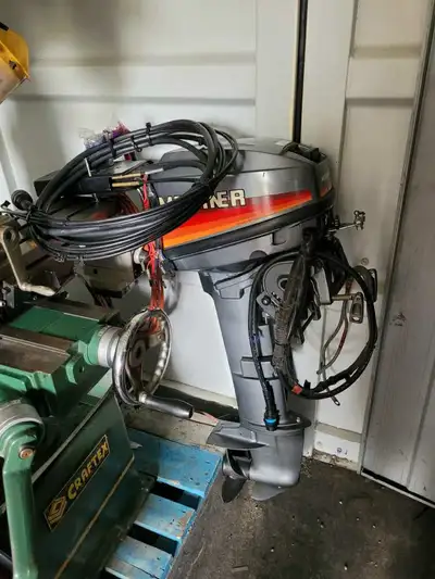 9.9 Mariner 2 stroke outboard motor , long shaft, electric start with controls
