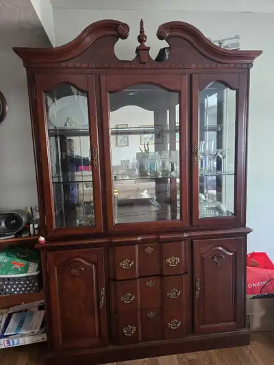 This is a gorgeous china cabinet or hutch buffet, perfect for displaying your finest dinnerware and...