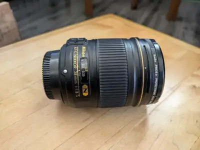 Nikon AF-S Nikkor 28mm  f1.8. Excellent condition, View more