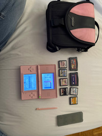 Pink Nintendo DS Lite with games