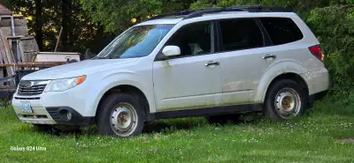 2009 Subaru Forester for perts or fix. Runs but needs power steering hoses, brakes maybe tie rod or...