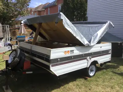 Converted tent trailer, solid, all lights work, bearings greased last year, brand new tires, it has...