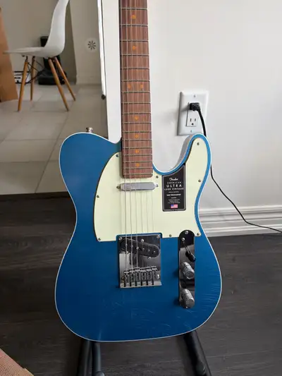Brand new Telecaster with hard case and all accessories, barely played. I swapped strings to 10s and...