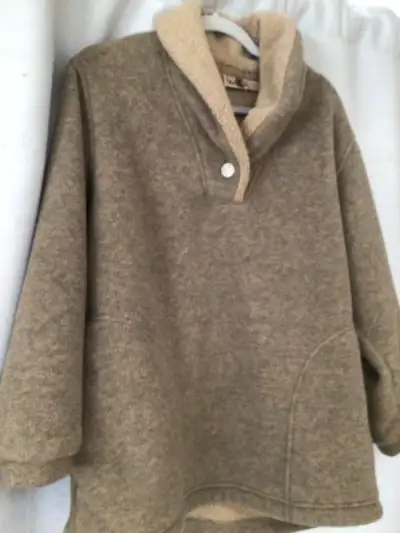This is said to be a small..I am a large and it fits fine. It is very warm and perfect for cross cou...