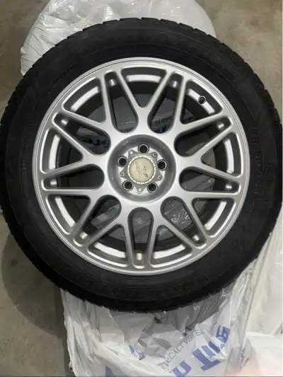 Good year ultra ice winter tires on wheels. Two tires are like new, the other two or somewhere betwe...