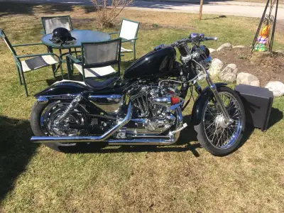 Verry low km custom 1200 Harley-Davidson sporty! Excellent bike lots of power and fun to ride!