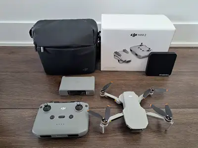 Drone à vendre "DJI Mini 2 fly more combo", résolution 4K, état: comme neuf, aucune égratignure, inc...