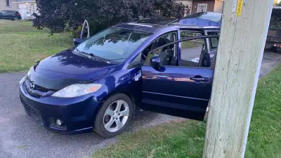 Mazda 5 runs very well Engine in good condition New battery from Costco - May Tires with rims for su...