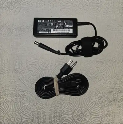 HP Laptop Power Supply, PN 519329-003 18.5 volts, 3.5 Amps, 65 watts. Located in Fenelon Falls. Plea...