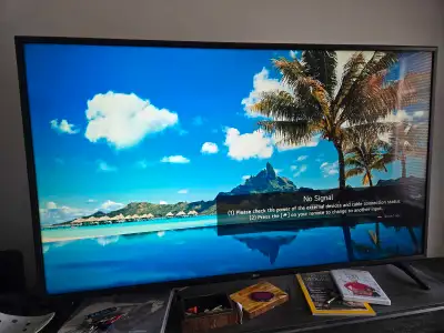 With remote, barely used, 4K TV LED HDR.