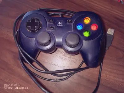 Simple controller for gaming on PC. Fairly used, but still functions great. Has dinput and xinput mo...