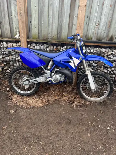 2002 yz125 Title in hand Shoot me a offer Garage kept no rust on frame Fully rebuilt top and bottom...