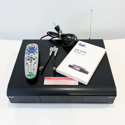 2 Bell satellite receivers up for sale. Each unit includes the remote and whatever you see in the ph...