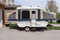 Sweet! Go camping with this beautiful tent-trailer