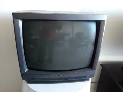 Retro Sharp  t.v.  for  gaming in original box, remote, View more