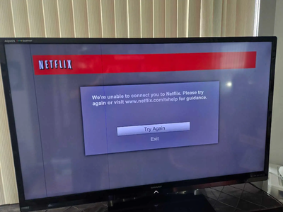Sharp TV with vertical lines and black spots, selling as is, View more