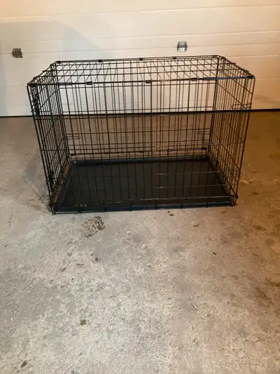 Medium Dog Kennel 36 inches long x 22 inches wide x 29 inches tall, $50. X posted no holds