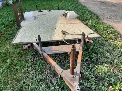70s Pop up trailer torn down to the floor selling AS IS as a utility trailer or do what you will wit...