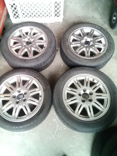 For sale Volvo Rims, left behind by renter. Tires need replacing. Some scuff marks on rims. Take a l...