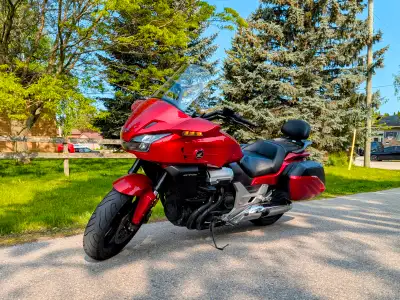 The CTX is part touring bike, part cruiser and features a smooth 1300 cc, liquid cooled, fuel-inject...