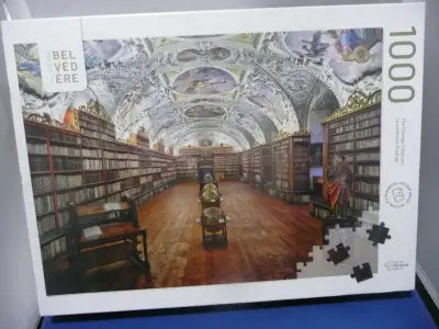 This is a brand new puzzle and still sealed. It is of a beautiful library. It has 1,000 pieces and l...