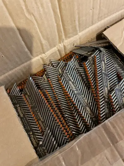 Huge box of Paslode framing nails. 2 inches. For use with 30-34 degree, clipped head nailer.
