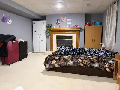 Room available in basement for a couple or two girls, sharing washroom, parking available