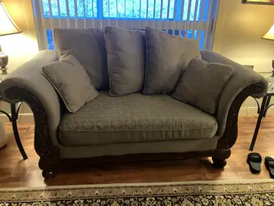 Green coach with decorative wood carvings, View more