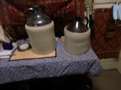 TWO ANTIQUE CERAMIC JUGS, View more
