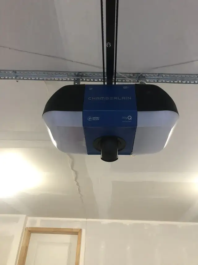 Garage door repair and opener installation 63235338577667121