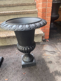 24 inch. Cast iron urn planter.145 dollar each