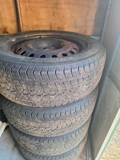 Winter tires and rims off Ford Explorer. 245/60R18 105s