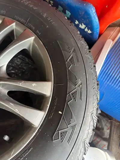 I am selling a set of used Firestone Winterforce tires mounted on stylish gunmetal aftermarket rims....