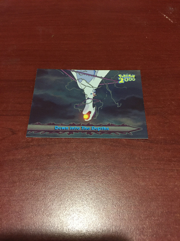Topps Pokemon 2000 movie Card # 58 Foil Down Into The Depths in Arts & Collectibles in Longueuil / South Shore