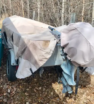 14’ Naden aluminum boat, 2 seats , and organizers . Comes with spare plugs , battery charge cord . 1...