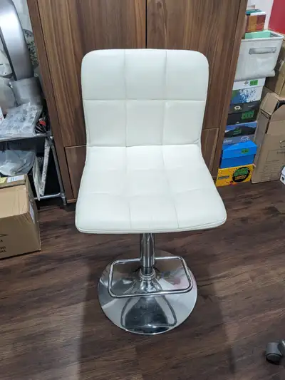 Adjustable White Bar Stool for $50, View more