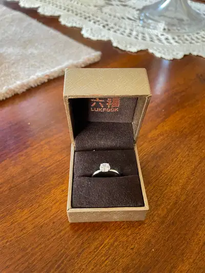 Beautiful diamond ring in its original box. This piece from LUKFOOK is a classic engagement or anniv...