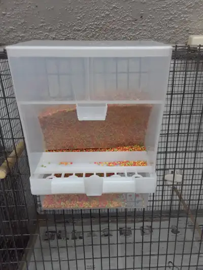 Automatic No Mess Bird Feeder for Cage - Easy Clean Container. 10 available. $8 each or $50 for all....