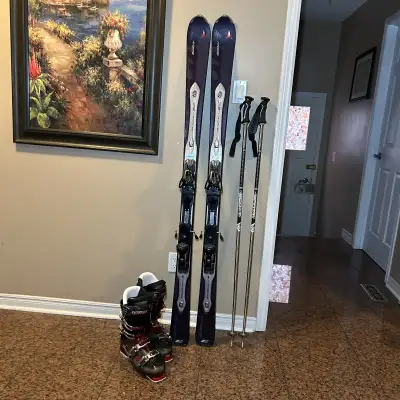 167 Atomic ski with boots ( poles ) , View more