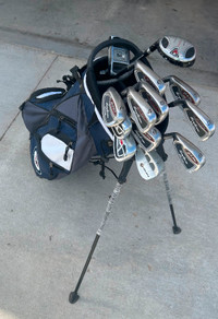 Set of men’s left handed Tommy Armour golf clubs and Jets bag