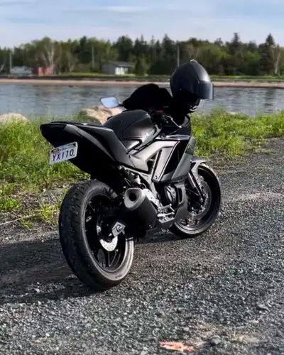 Get ready to turn heads with this sleek, all-black 2020 Yamaha YZF-R 300CC! This used sportbike is p...