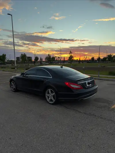 selling my beautiful cls 550 4matic with a rare designo brown interior with real wood trim build dat...