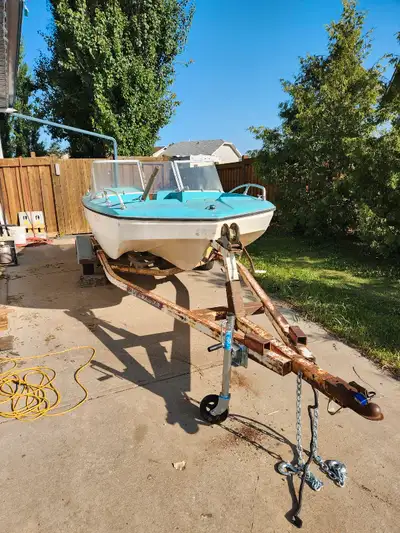 Older Boat and Trailer. No can't read vin on Trailer so thats why its so cheap. Gonna have to buy a...