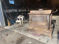 Cast Iron Wood Stove and Stainless Steel Venting